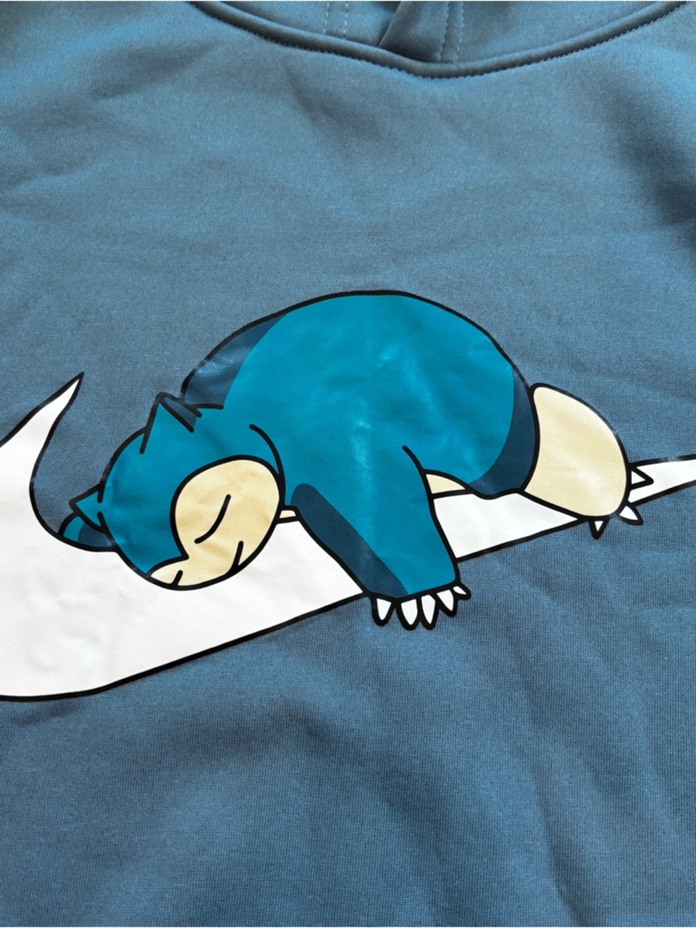 Teal Pullover Hoodie with White Swoosh and Sleeping Creature - Picture 5 of 9